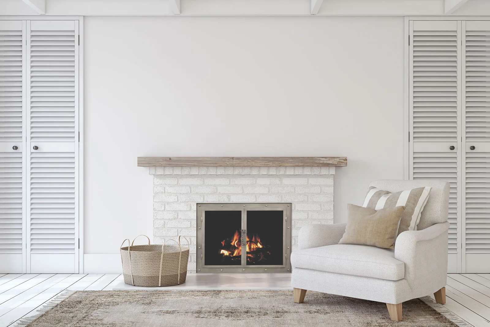 A Stoll custom glass door set fitted to a fireplace with the fire glowing behind the glass